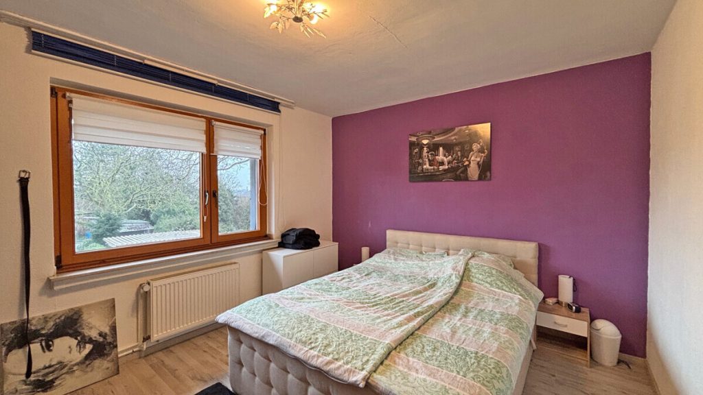 Volksbank Immobilien Niederrhein GmbH - Immobilienangebot - Voerde - Alle - Gepflegtes Zweifamilienhaus in Voerde-Spellen mit großem Grundstück!