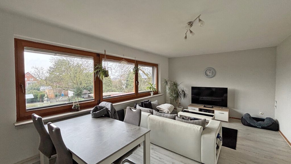 Volksbank Immobilien Niederrhein GmbH - Immobilienangebot - Voerde - Alle - Gepflegtes Zweifamilienhaus in Voerde-Spellen mit großem Grundstück!
