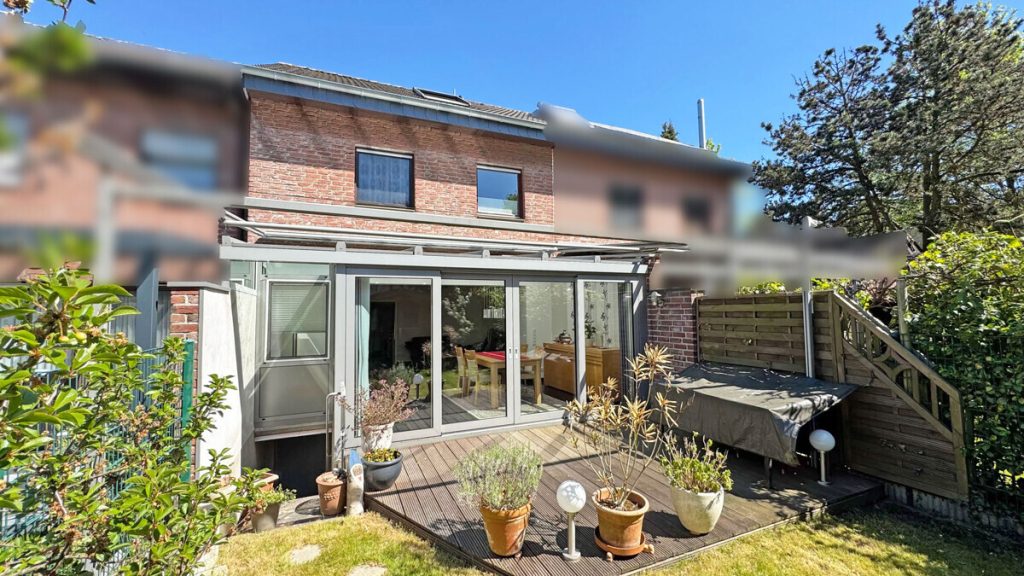 Volksbank Immobilien Niederrhein GmbH - Immobilienangebot - Voerde - Alle - Saniertes Reihenmittelhaus mit Wintergarten in begehrter Lage von Voerde-Friedrichsfeld