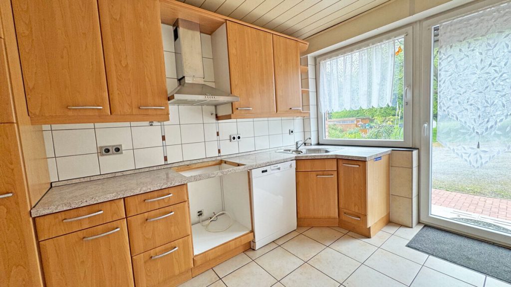 Volksbank Immobilien Niederrhein GmbH - Immobilienangebot - Voerde - Alle - Komfortable Erdgeschosswohnung mit Terrasse, Kamin und großem Gemeinschaftsgrundstück in Spellen!