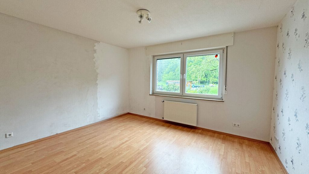 Volksbank Immobilien Niederrhein GmbH - Immobilienangebot - Voerde - Alle - Komfortable Erdgeschosswohnung mit Terrasse, Kamin und großem Gemeinschaftsgrundstück in Spellen!