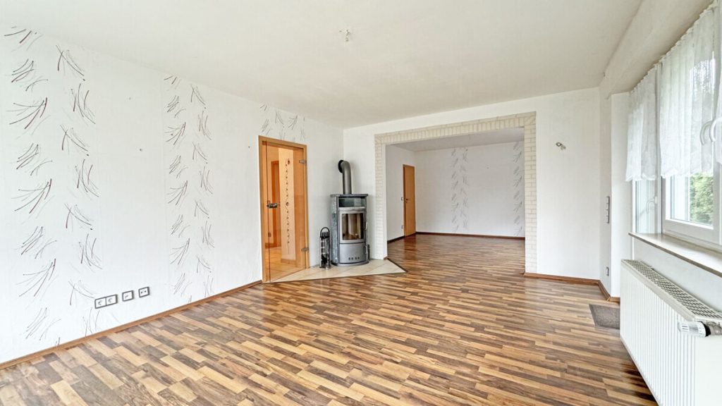 Volksbank Immobilien Niederrhein GmbH - Immobilienangebot - Voerde - Alle - Komfortable Erdgeschosswohnung mit Terrasse, Kamin und großem Gemeinschaftsgrundstück in Spellen!