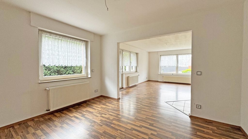 Volksbank Immobilien Niederrhein GmbH - Immobilienangebot - Voerde - Alle - Komfortable Erdgeschosswohnung mit Terrasse, Kamin und großem Gemeinschaftsgrundstück in Spellen!