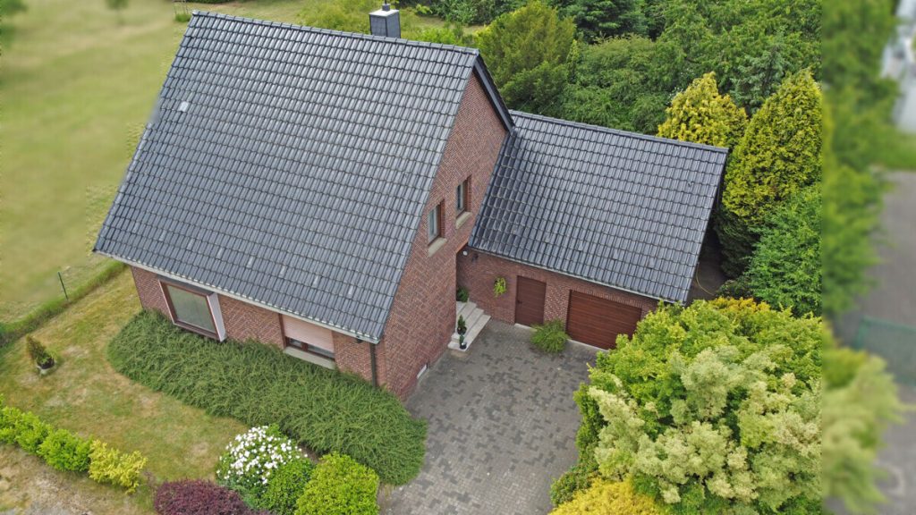 Volksbank Immobilien Niederrhein GmbH - Immobilienangebot - Voerde - Alle - Gepflegtes Einfamilienhaus mit großem Grundstück und möglicher Neubauperspektive in Voerde-Stockum!