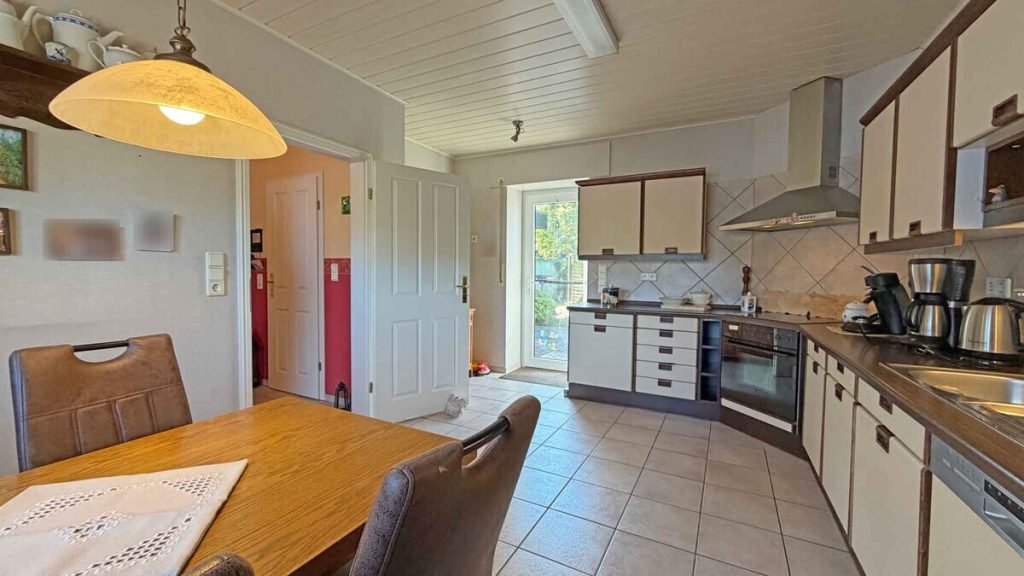 Volksbank Immobilien Niederrhein GmbH - Immobilienangebot - Alpen - Alle - Wohnen und werken! Gepflegter Bungalow mit angebauter Werkhalle in Alpen-Menzelen!