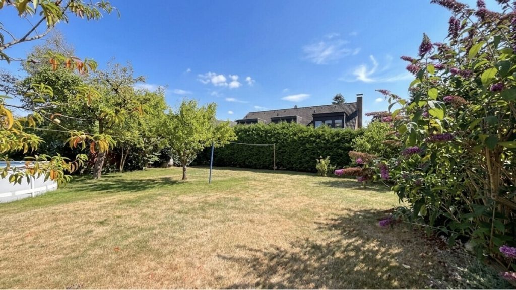 Volksbank Immobilien Niederrhein GmbH - Immobilienangebot - Hamminkeln - Alle - Raumwunder in ruhiger Lage von Mehrhoog mit weitläufigem Südwestgarten und vielseitigem Potenzial