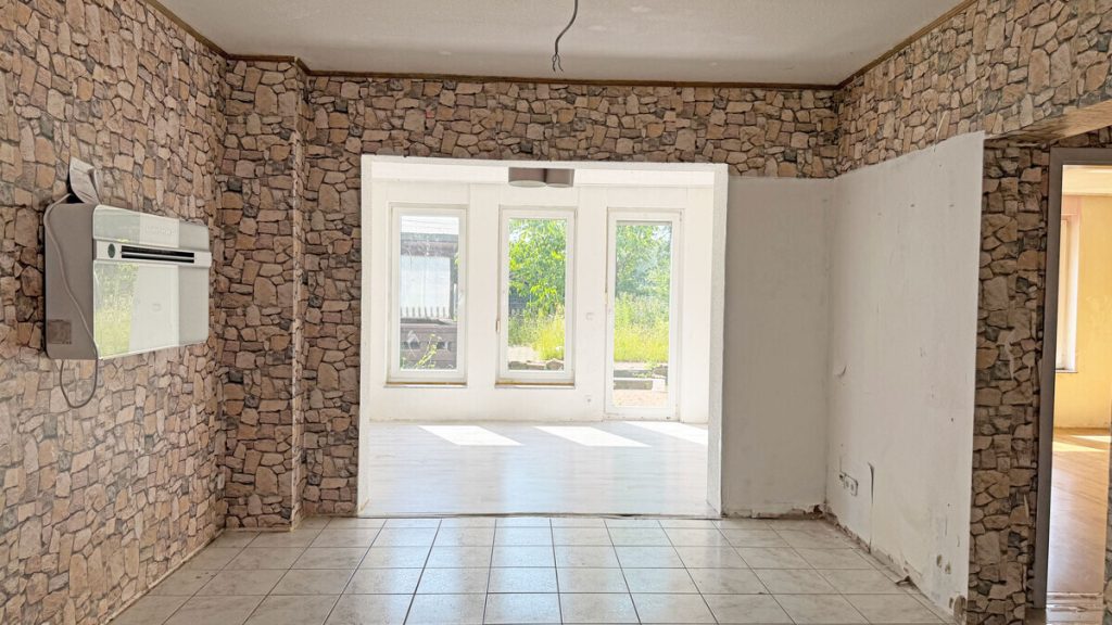 Volksbank Immobilien Niederrhein GmbH - Immobilienangebot - Wesel - Alle - Viel Platz für Ihre Ideen – Erdgeschosswohnung mit Garten, und Garage nahe des Rheins in Wesel!