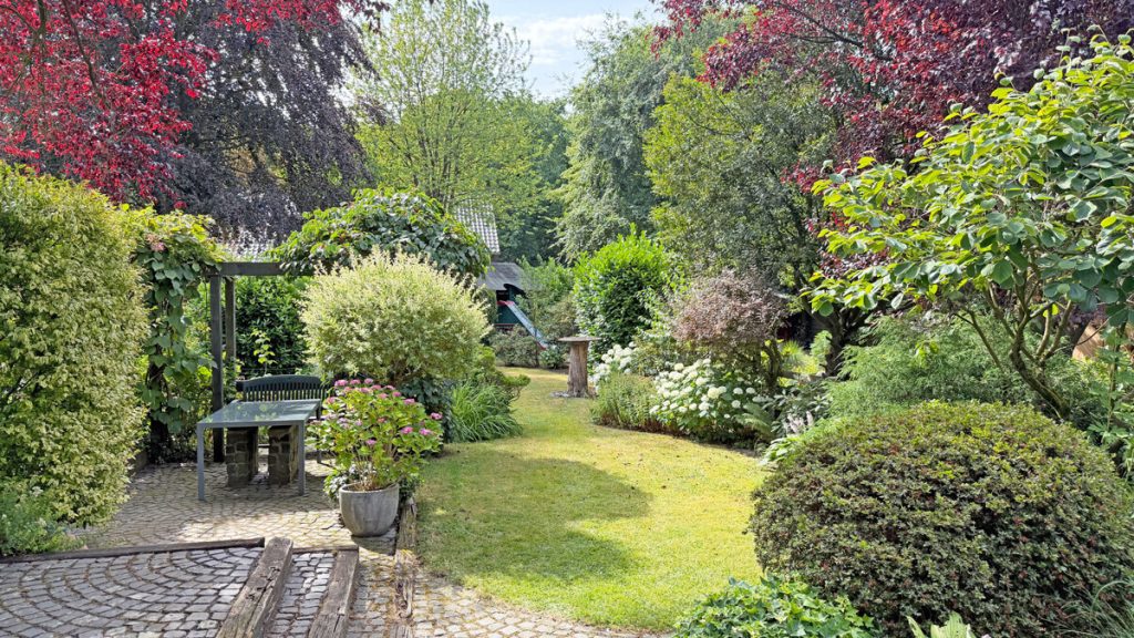Volksbank Immobilien Niederrhein GmbH - Immobilienangebot - Voerde - Alle - Gepflegte Doppelhaushälfte in Sackgassenlage von Voerde-Möllen, familienfreundlich mit großem Garten
