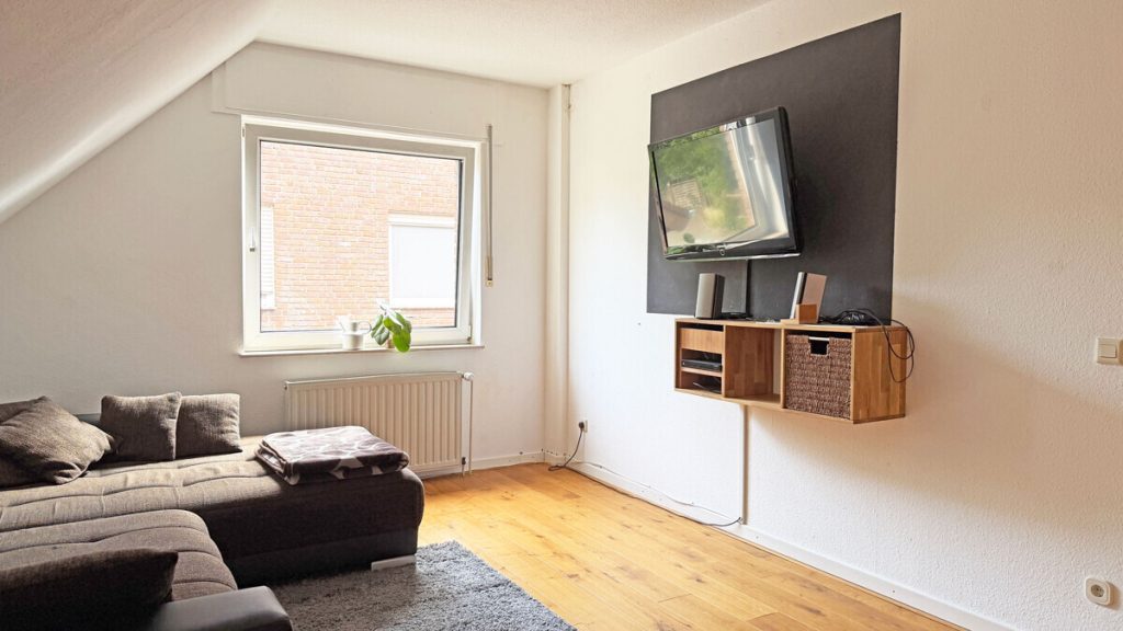 Volksbank Immobilien Niederrhein GmbH - Immobilienangebot - Voerde - Alle - Gepflegte Doppelhaushälfte in Sackgassenlage von Voerde-Möllen, familienfreundlich mit großem Garten