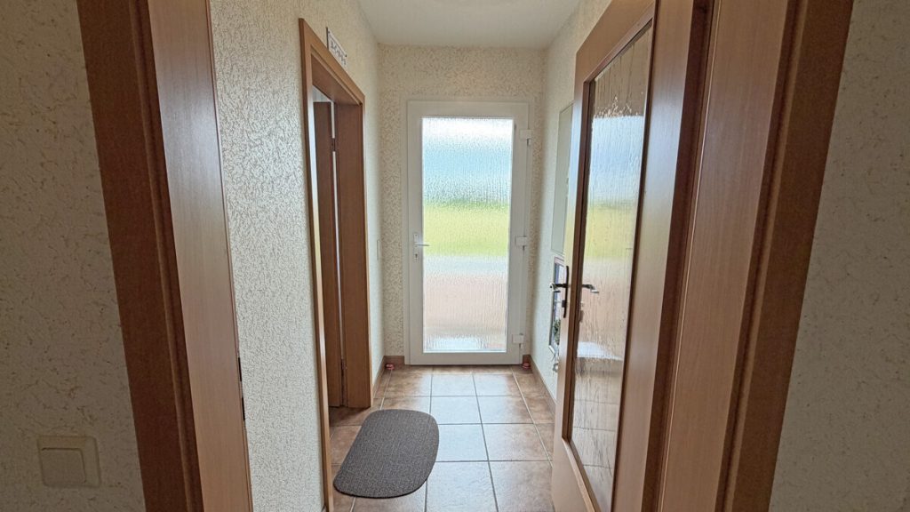 Volksbank Immobilien Niederrhein GmbH - Immobilienangebot - Rees - Alle - Ein Rückzugsort am Niederrhein – Exklusives Zweifamilienhaus in idyllischer Alleinlage