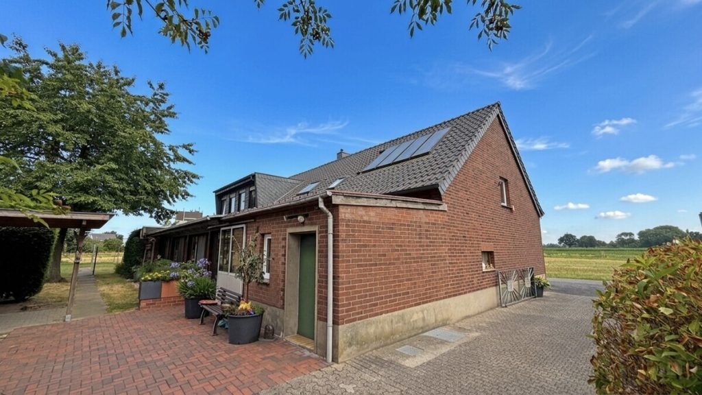 Volksbank Immobilien Niederrhein GmbH - Immobilienangebot - Rees - Alle - Ein Rückzugsort am Niederrhein – Exklusives Zweifamilienhaus in idyllischer Alleinlage