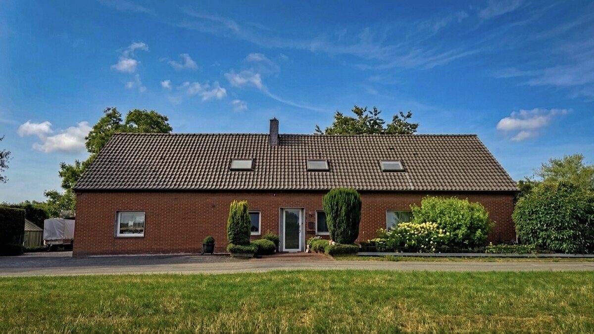 Volksbank Immobilien Niederrhein GmbH - Immobilienangebot - Rees - Alle - Ein Rückzugsort am Niederrhein – Exklusives Zweifamilienhaus in idyllischer Alleinlage