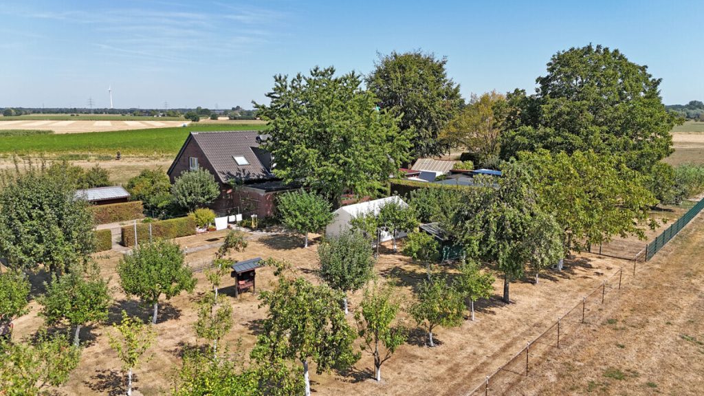 Volksbank Immobilien Niederrhein GmbH - Immobilienangebot - Rees - Alle - Ein Rückzugsort am Niederrhein – Exklusives Zweifamilienhaus in idyllischer Alleinlage