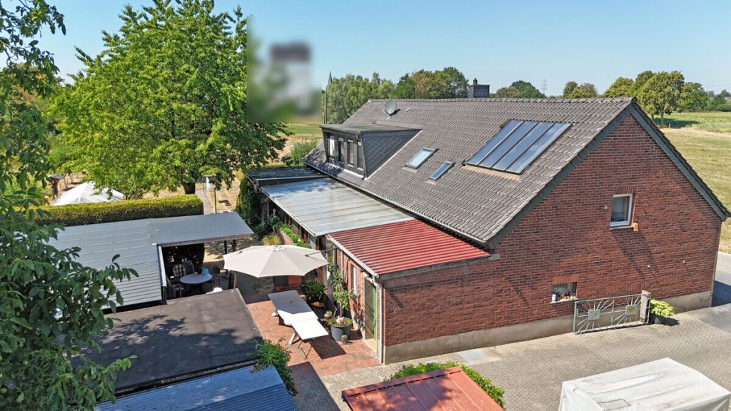 Volksbank Immobilien Niederrhein GmbH - Immobilienangebot - Rees - Alle - Ein Rückzugsort am Niederrhein – Exklusives Zweifamilienhaus in idyllischer Alleinlage