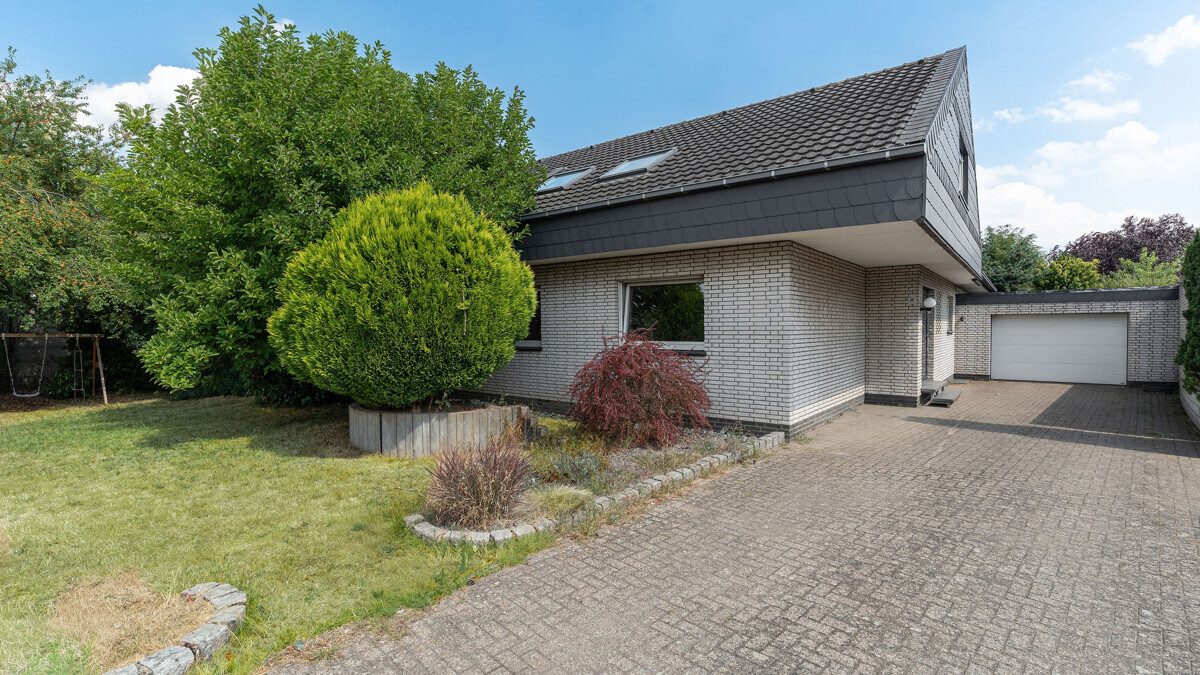 Volksbank Immobilien Niederrhein GmbH - Immobilienangebot - Hamminkeln - Alle - Wohnen in begehrter Lage von Hamminkeln – Einfamilienhaus mit großem Grundstück & Doppelgarage
