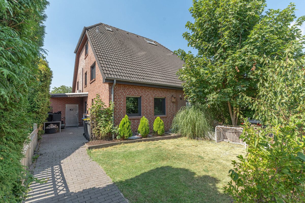 Volksbank Immobilien Niederrhein GmbH - Immobilienangebot - Wesel - Alle - Lackhausen aufgepasst! Familienfreundliche Doppelhaushälfte mit schönem Grundstück und Garage!