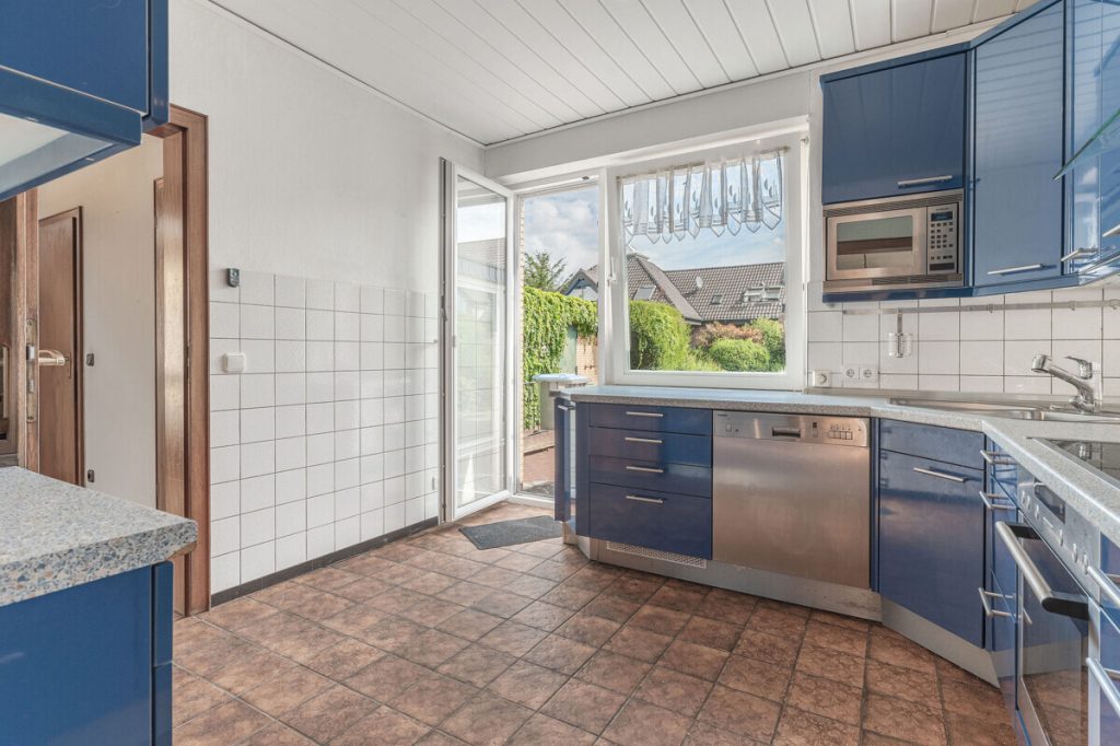 Volksbank Immobilien Niederrhein GmbH - Immobilienangebot - Wesel - Alle - Freistehendes Einfamilienhaus mit Garage und großem Grundstück in ruhiger Lage von Wesel-Lackhausen
