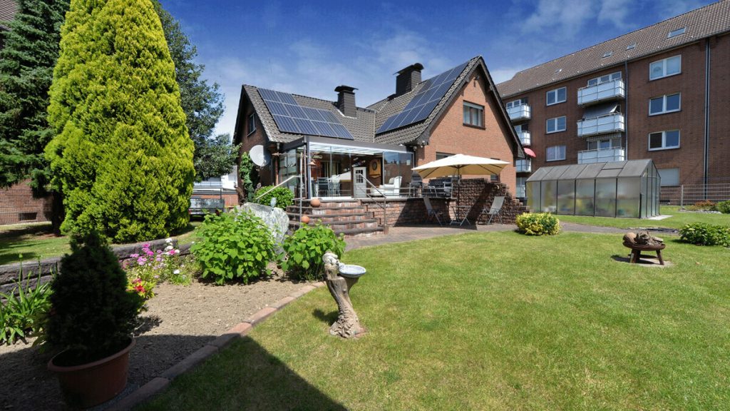 Volksbank Immobilien Niederrhein GmbH - Immobilienangebot - Moers - Alle - Großzügiges Zuhause mit Wintergarten und Idylle in Moers-Repelen