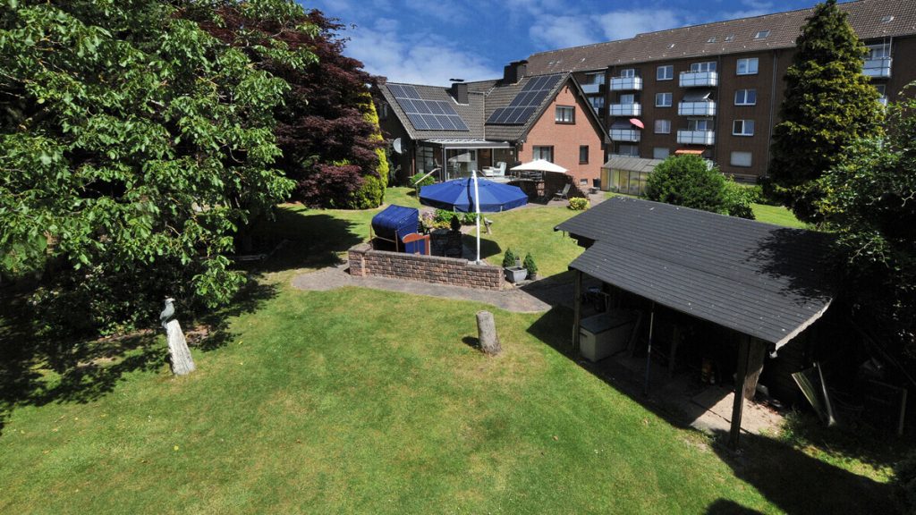 Volksbank Immobilien Niederrhein GmbH - Immobilienangebot - Moers - Alle - Großzügiges Zuhause mit Wintergarten und Idylle in Moers-Repelen