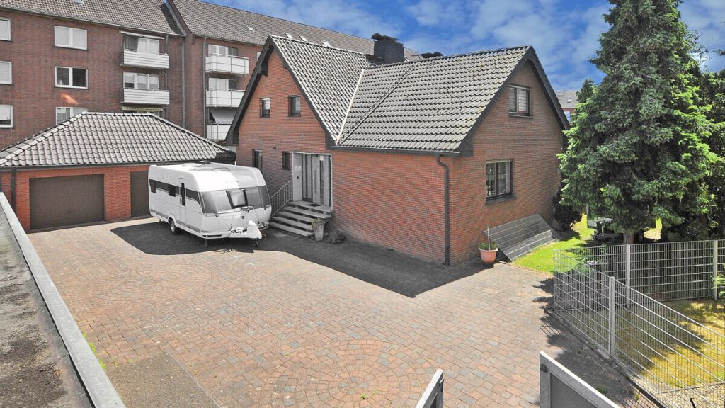 Volksbank Immobilien Niederrhein GmbH - Immobilienangebot - Moers - Alle - Großzügiges Zuhause mit Wintergarten und Idylle in Moers-Repelen