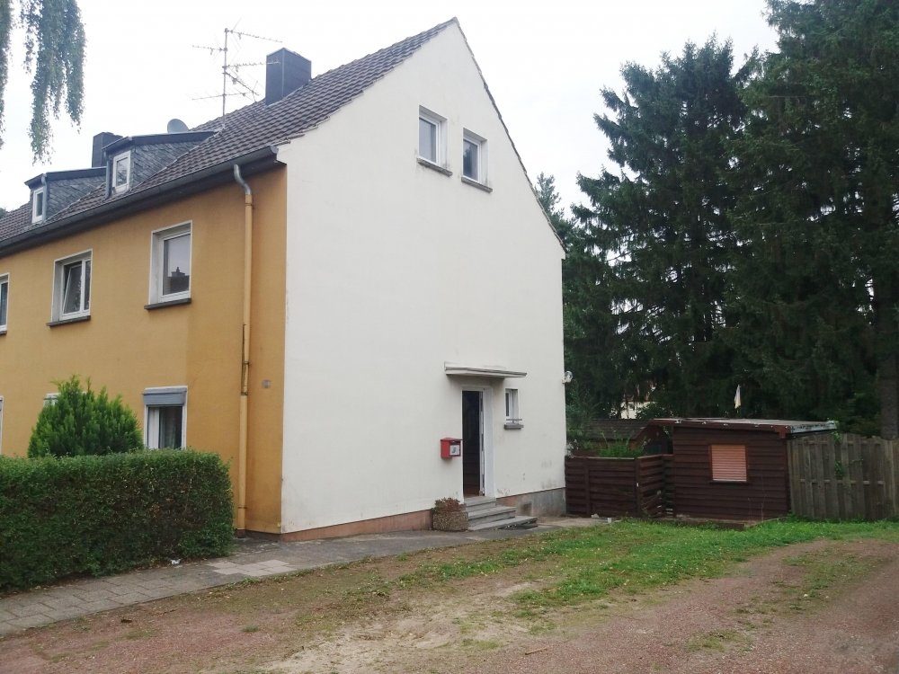 Immobilienangebot - Baesweiler - Wohnen - Doppelhaushälfte mit Garten und Garage in ruhiger zentraler Lage
