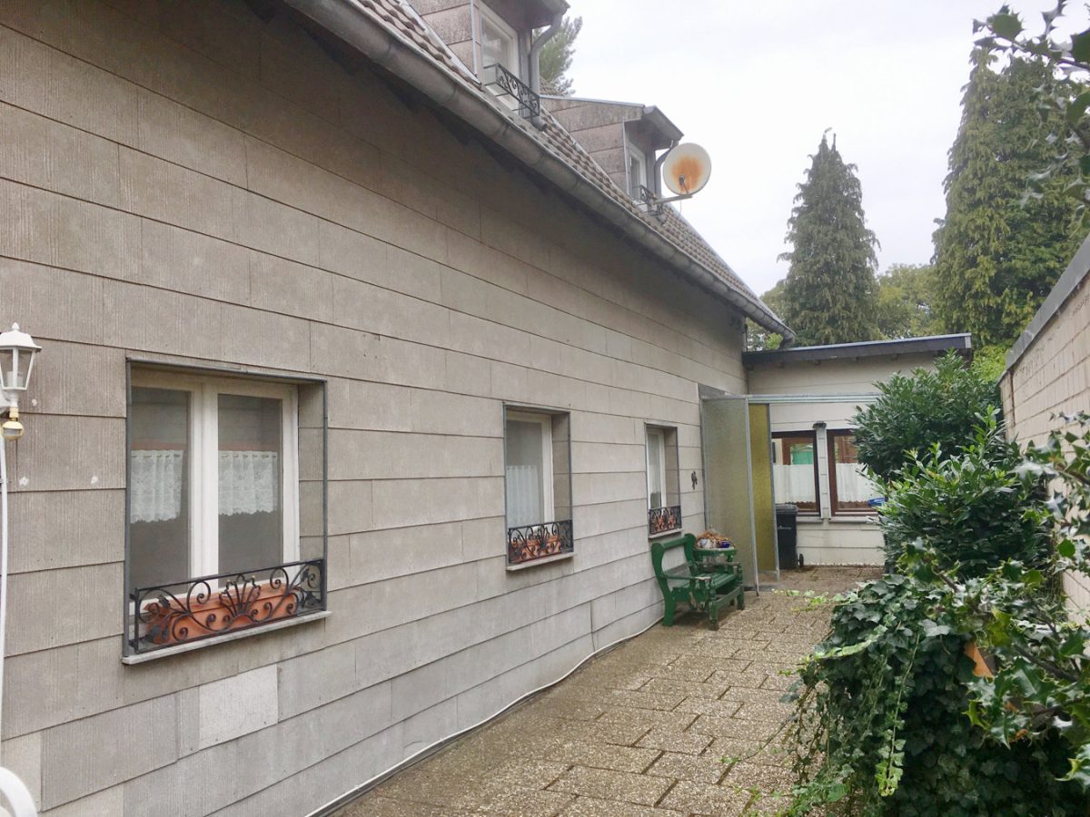 Immobilienangebot - Herzogenrath - Wohnen - Sanierungsbedürftiges Einfamilienhaus mit angrenzender Ackerlandparzelle