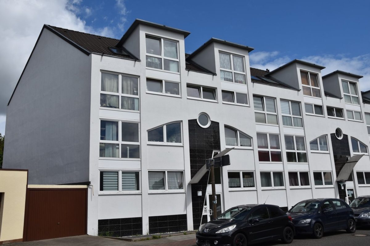 Immobilienangebot - Eschweiler - Wohnen - Langjährig vermietete Eigentumswohnung mit PKW-Stellplatz als solide Kapitalanlage in Eschweiler