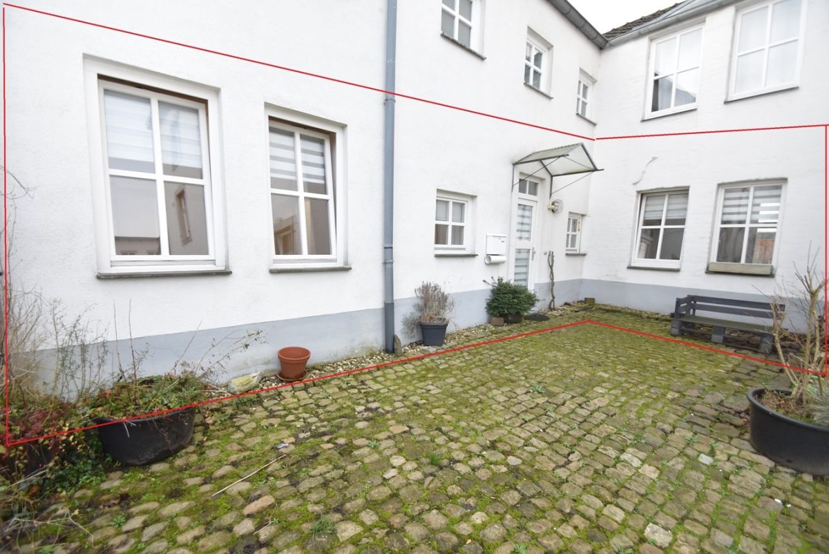 Immobilienangebot - Eschweiler - Wohnen - Gepflegte Erdgeschosswohnung mit Terrasse in historischer Hofanlage