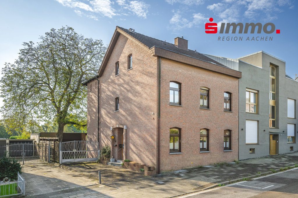 Immobilienangebot - Herzogenrath - Wohnen - Bezugsfreies Zweifamilienhaus mit Garage und großem Süd-Garten