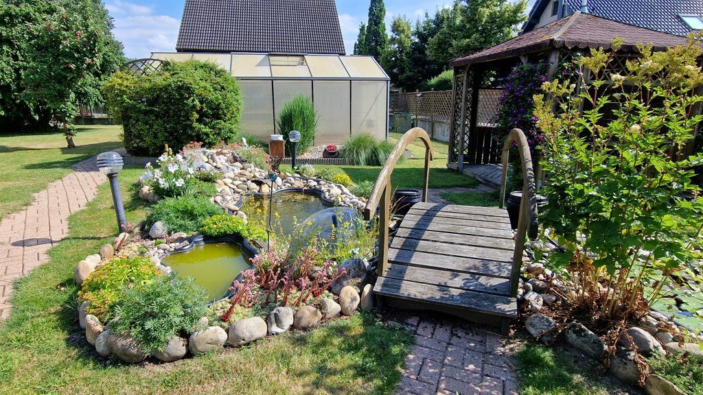 Immobilienangebot - Jülich - Wohnen - Freistehendes Einfamilienhaus mit großem Grundstück und separater Bauparzelle
