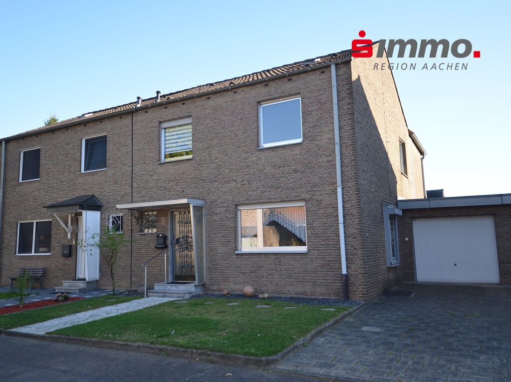 Immobilienangebot - Baesweiler - Wohnen - Bezugsfreie Doppelhaushälfte mit großem Grundstück und Garage