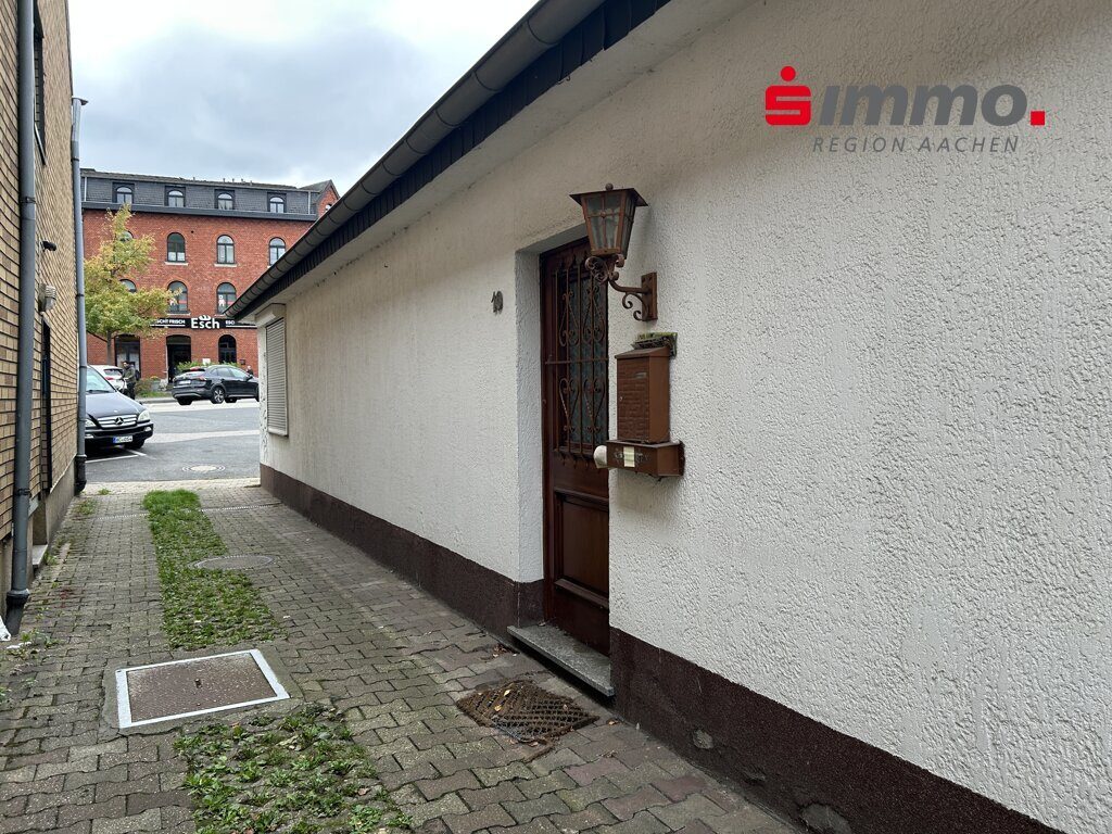 Immobilienangebot - Aachen - Wohnen - Bungalow mit 2 Garagen in zentraler Lage von Aachen-Eilendorf