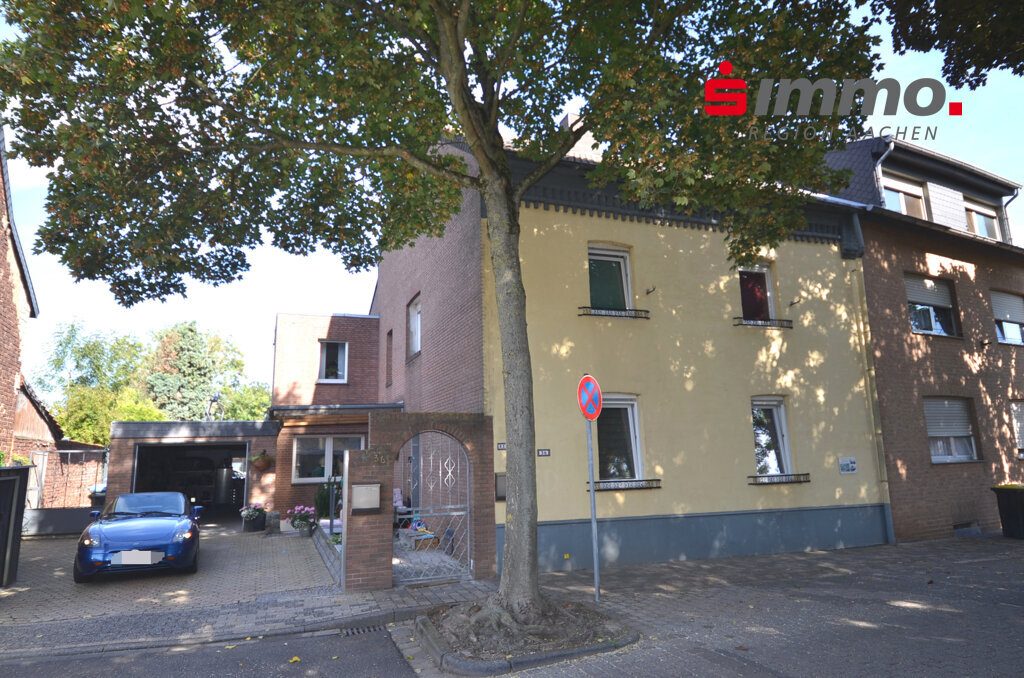 Immobilienangebot - Baesweiler - Wohnen - Zweifamilienhaus mit Garage und großem Grundstück