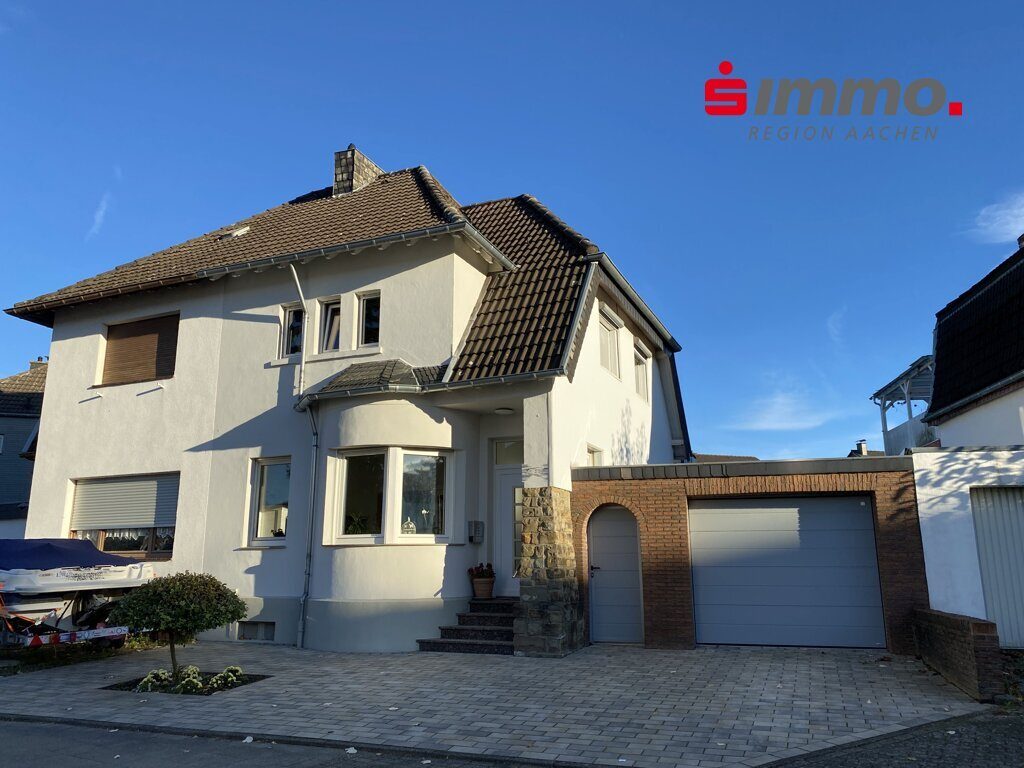 Immobilienangebot - Eschweiler - Wohnen - Halbfreistehendes EFH mit Garten und Garage