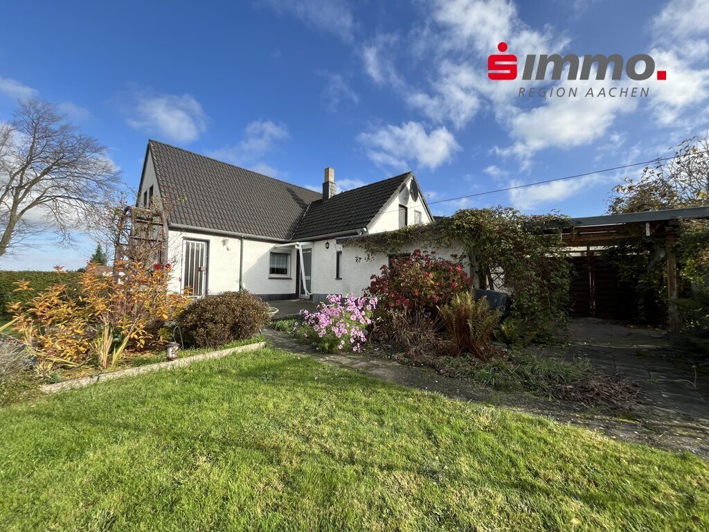Immobilienangebot - Alsdorf - Wohnen - Renovierungsbedürftiges Einfamilienhaus mit Garage und großem Süd-Grundstück