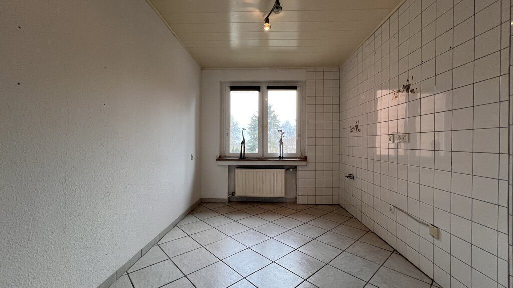Immobilienangebot - Alsdorf - Wohnen - Sanierungsbedürftiges Einfamilienhaus
mit sonnigem Grundstück in ruhiger Lage