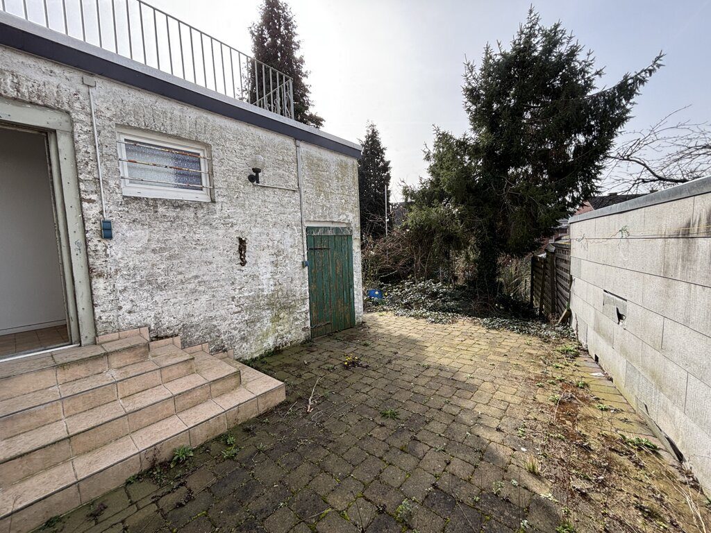 Immobilienangebot - Würselen - Wohnen - Modernisierungsbedürftiges Einfamilienhaus mit Garage und Sonnengrundstück im Herzen von Bardenberg