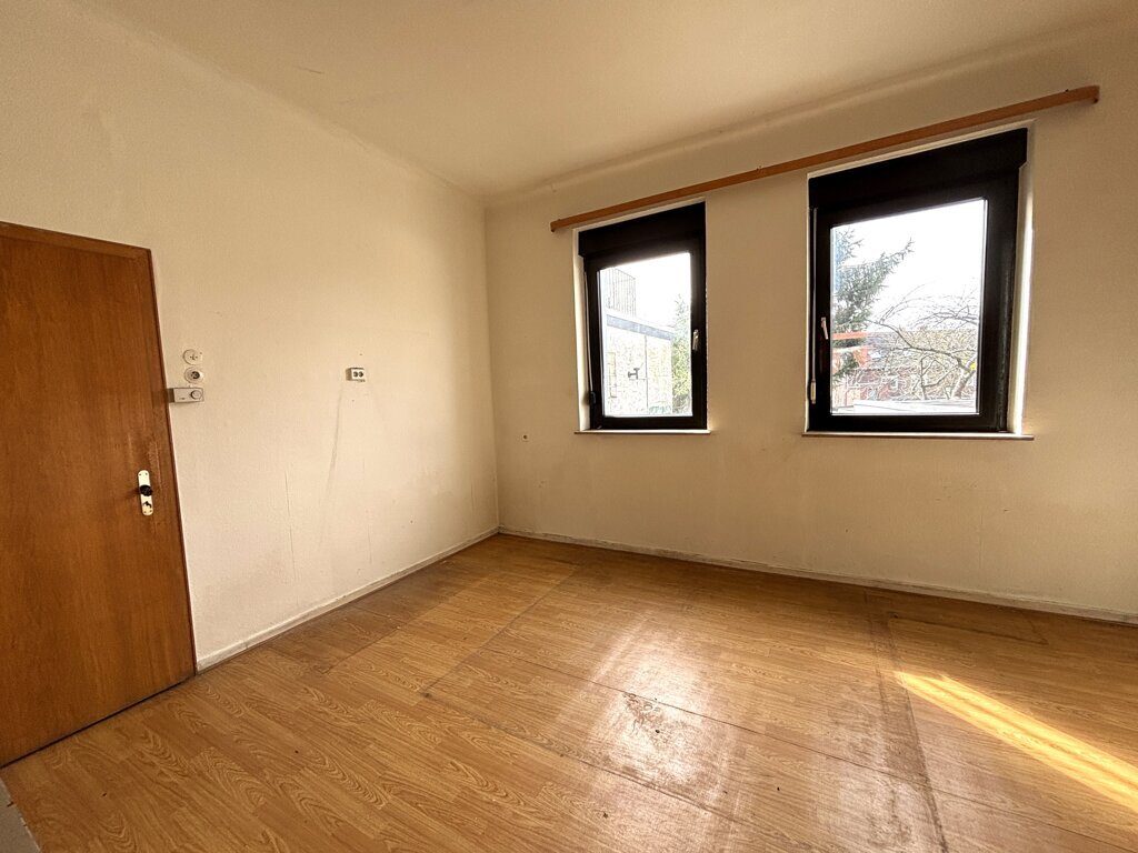 Immobilienangebot - Würselen - Wohnen - Modernisierungsbedürftiges Einfamilienhaus mit Garage und Sonnengrundstück im Herzen von Bardenberg