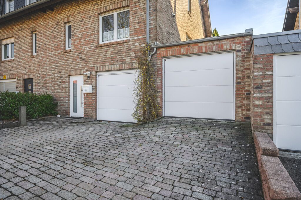 Immobilienangebot - Langerwehe - Wohnen - Charmantes Einfamilienhaus für die Familie
mit sonnigem Garten und Doppelgarage in ruhiger Lage