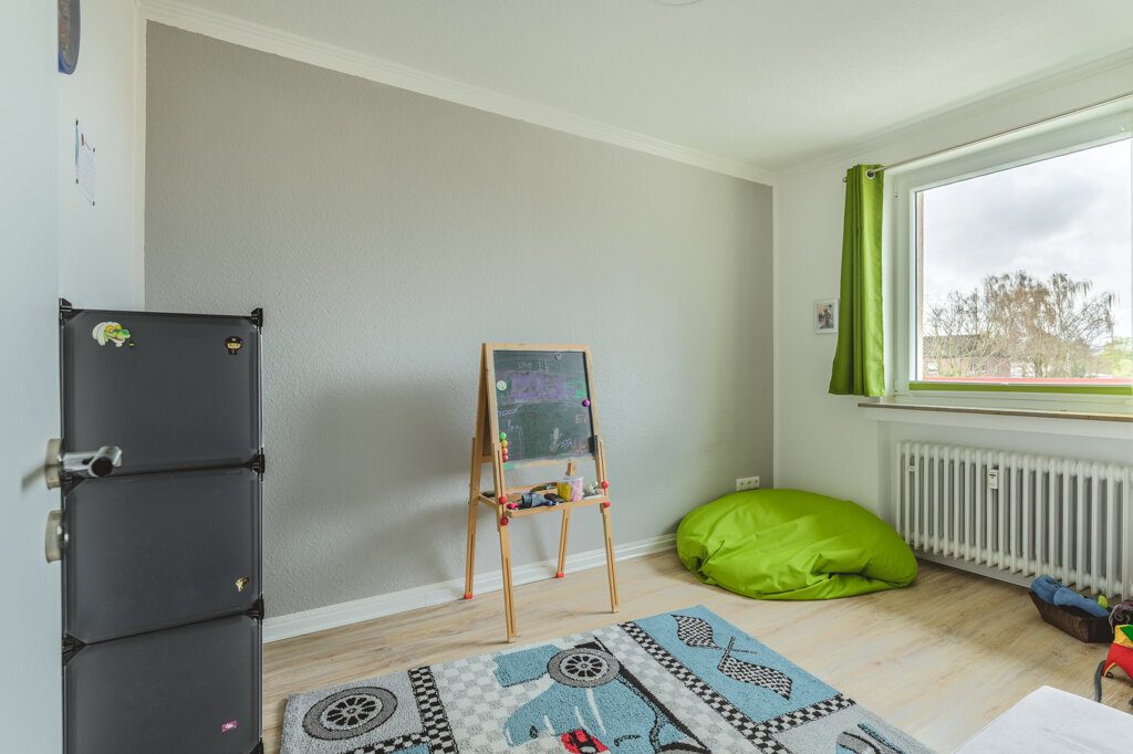 Immobilienangebot - Herzogenrath - Renditehäuser - Modernisiertes Niedrigenergiehaus mit 11 Parteien, Garagen und Stellplätzen im Herzen von Kohlscheid
