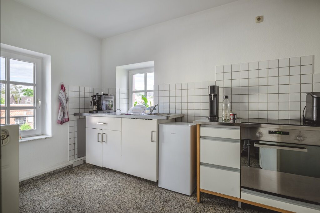 Immobilienangebot - Aachen - Renditehäuser - Historische Fassade, moderne Substanz – Wohn- und Geschäftshaus im Wohnungseigentum mit 10 Stellplätzen in Aachen-Brand