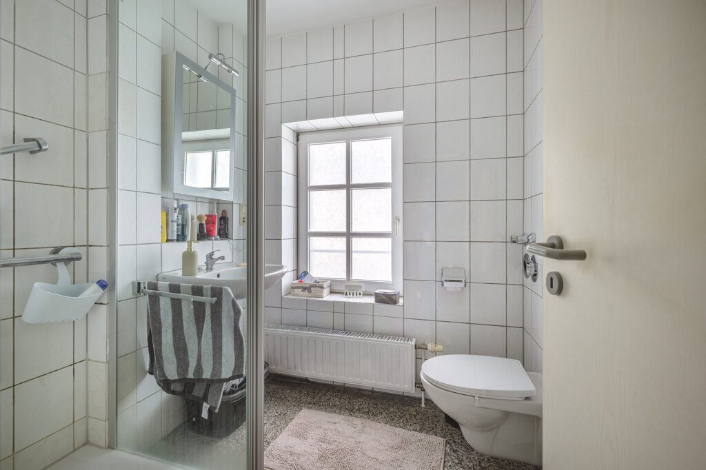 Immobilienangebot - Aachen - Renditehäuser - Historische Fassade, moderne Substanz – Wohn- und Geschäftshaus im Wohnungseigentum mit 10 Stellplätzen in Aachen-Brand
