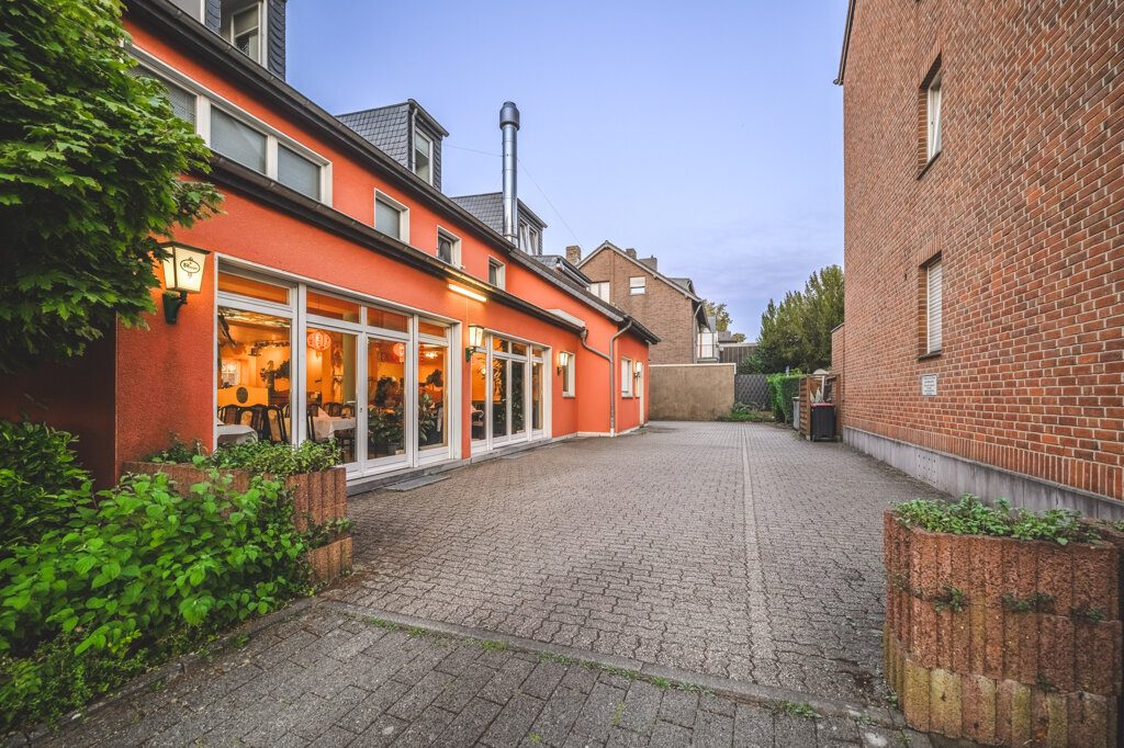 Immobilienangebot - Aachen - Renditehäuser - Historische Fassade, moderne Substanz – Wohn- und Geschäftshaus im Wohnungseigentum mit 10 Stellplätzen in Aachen-Brand