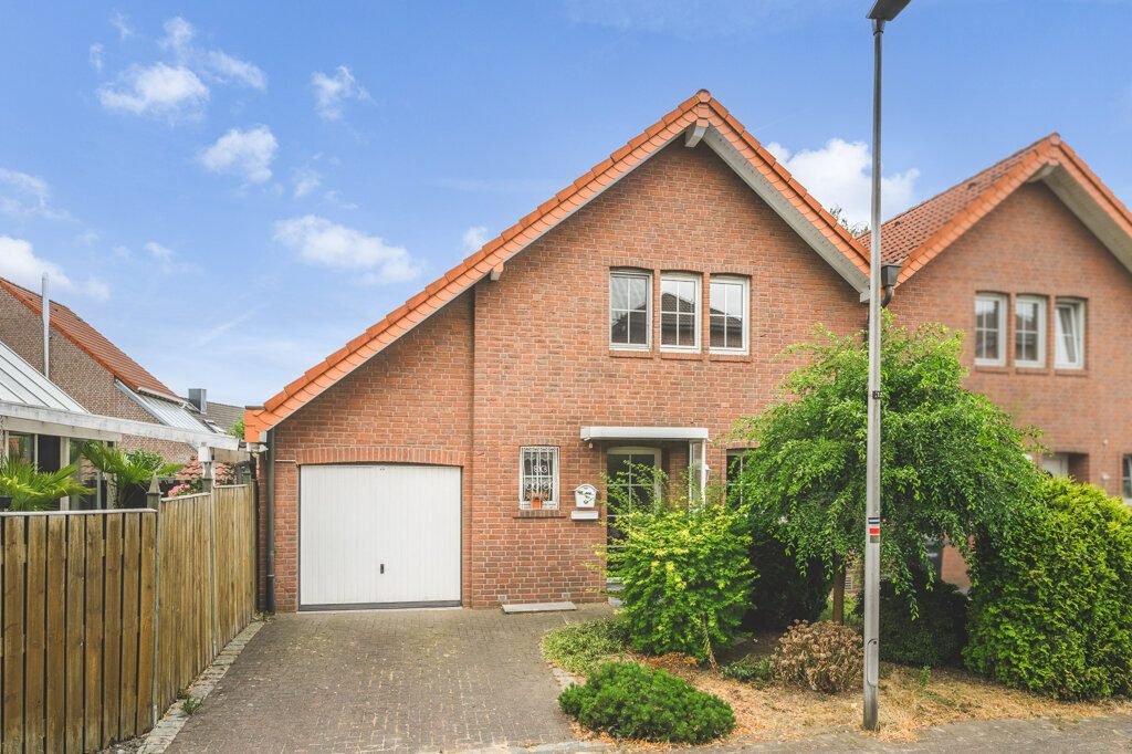 Immobilienangebot - Geilenkirchen - Wohnen - Geilenkirchen-Bauchem, Doppelhaushälfte mit großer Garage und schönem Garten in beliebter Wohnlage