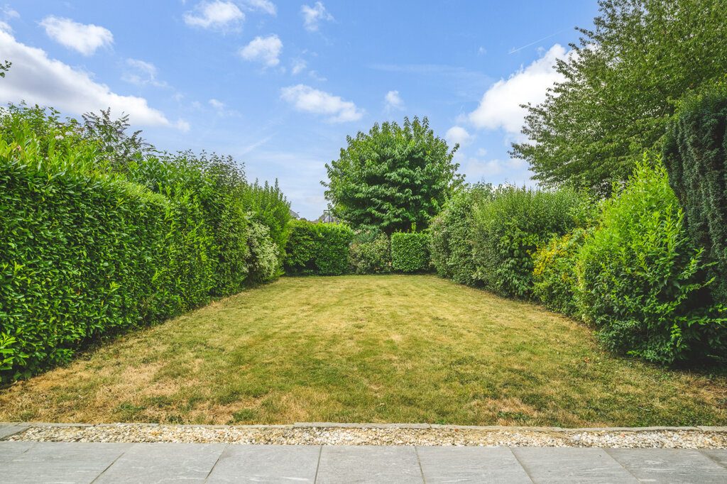 Immobilienangebot - Geilenkirchen - Wohnen - Geilenkirchen-Bauchem, Doppelhaushälfte mit großer Garage und schönem Garten in beliebter Wohnlage