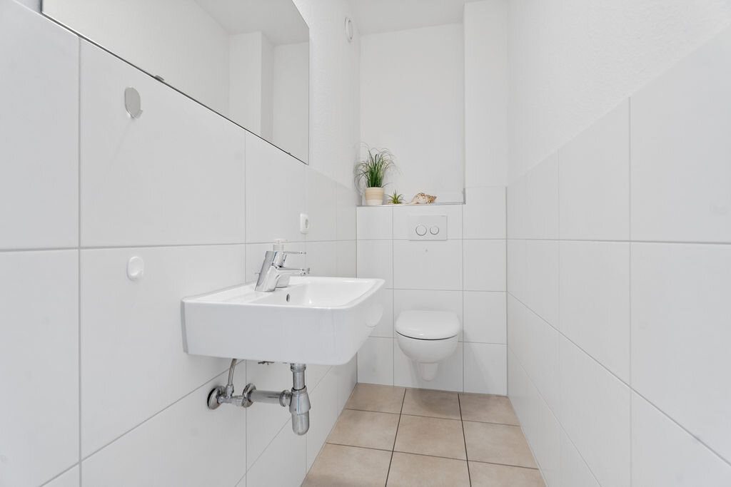Immobilienangebot - Baesweiler - Wohnen - Altersgerechte, vermietete Eigentumswohnung über den Dächern von Baesweiler