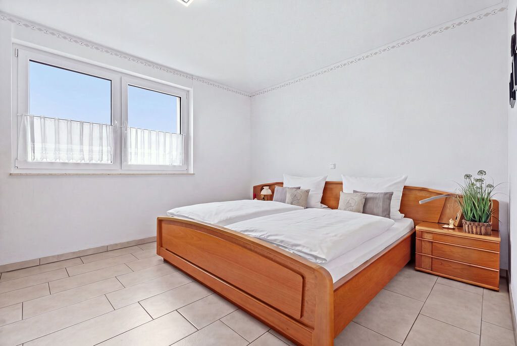 Immobilienangebot - Baesweiler - Wohnen - Altersgerechte, vermietete Eigentumswohnung über den Dächern von Baesweiler