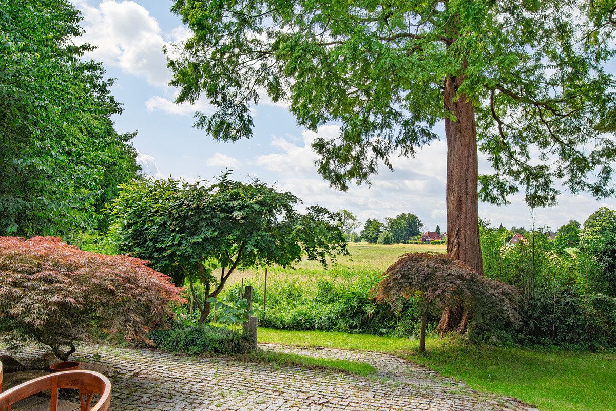 Immobilienangebot - Stade - Alle - Wohnen im Grünen: Architektur und Natur perfekt vereint!