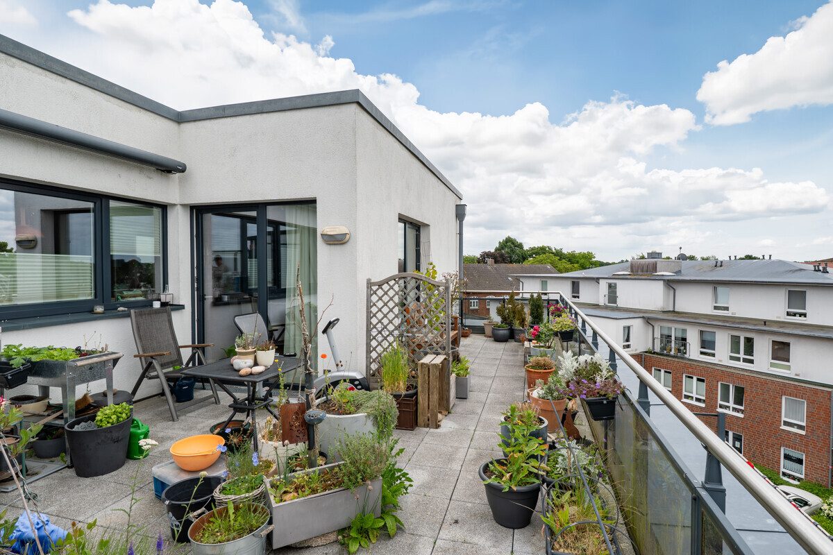 Immobilienangebot - Schönberg - Alle - Penthouse-Juwel mit Dachterrasse und Wallbox in Bestlage!