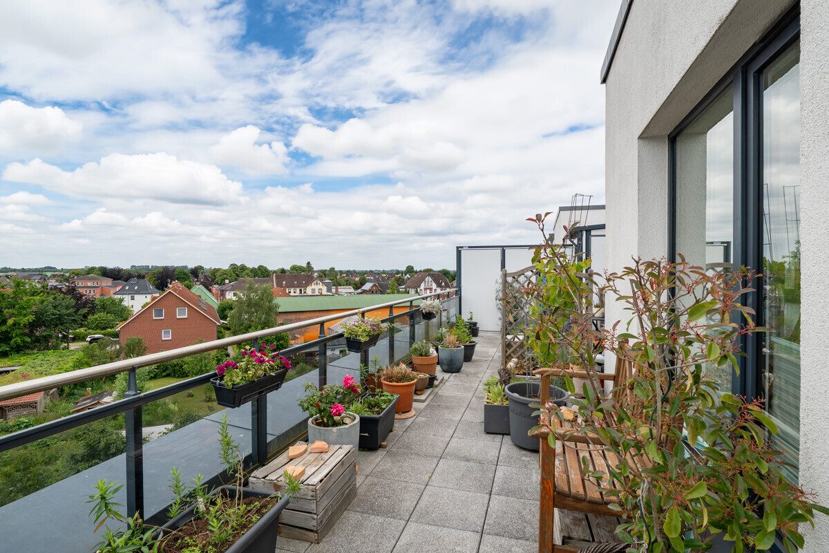 Immobilienangebot - Schönberg - Alle - Penthouse-Juwel mit Dachterrasse und Wallbox in Bestlage!